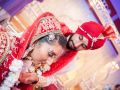 Sona and Amer in wedding dress by Resh Rall Wedding Photography, Leeds